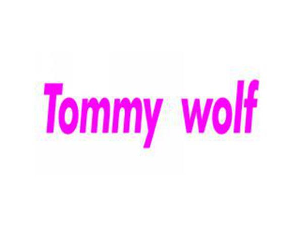 TOMMY WOLF